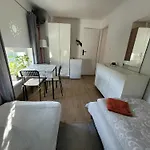 Villa 20a, Dom 11 Miejsc